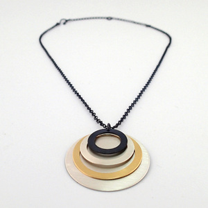 Three Rings Pendant Necklace in Mixed Metals by Lauren Mullaney