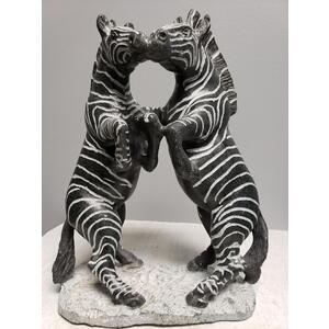Kissing Zebras by Peter Rujuwa
