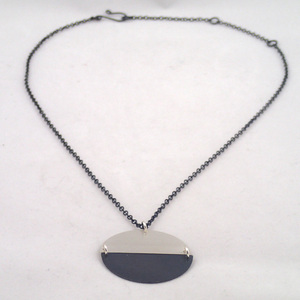 Hemisphere Necklace in silver and oxidized by Lauren Mullaney