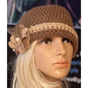 Women’s winter hat with a decorative brooch. by Sherri Gold