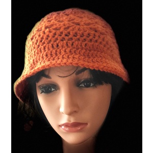 Women’s orange floppy brim hat  by Sherri Gold