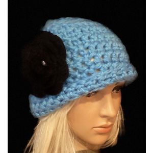 Women’s persons blue brimmed heart with a black flower by Sherri Gold