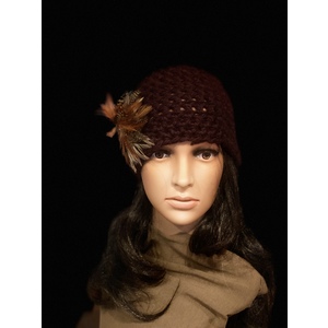 Women’s chocolate brown beanie with a feather brooch. by Sherri Gold