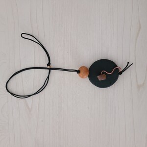 Black and Antique Gold Clay Bead Pendant by Susan Paolilli