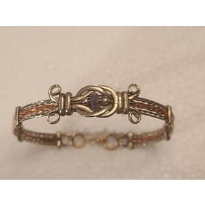 metal love knot bracelet with copper bangle and amethyst stone by Sergio Barcena