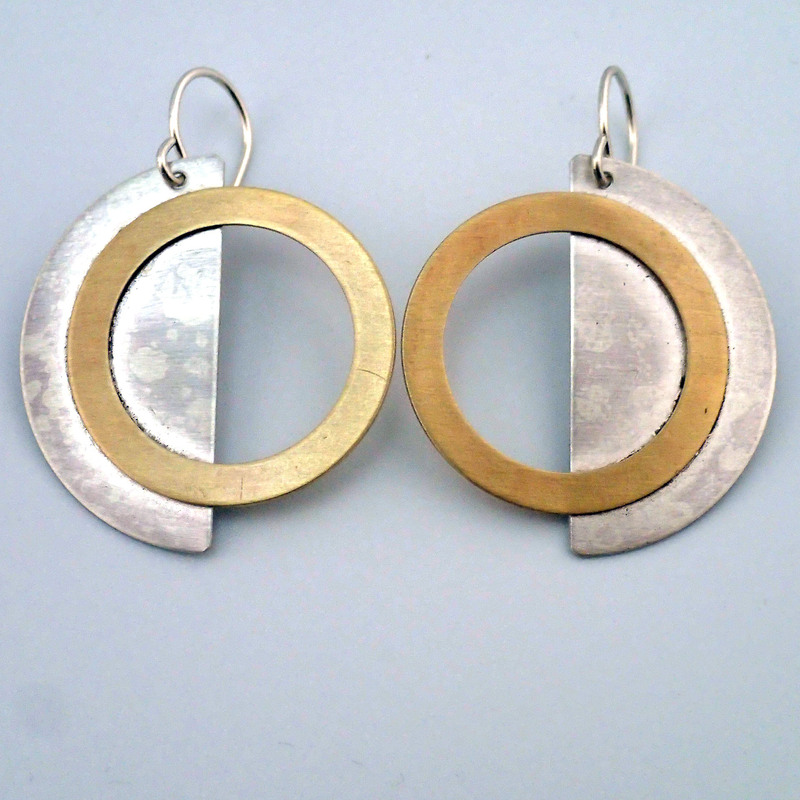 Eclipse earrings in silver and brass by Lauren Mullaney