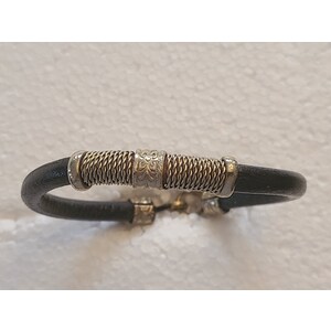 Leather bracelet with twisted silver by Sergio Barcena