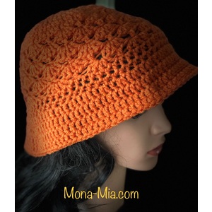 Women’s orange floppy brim hat  by Sherri Gold
