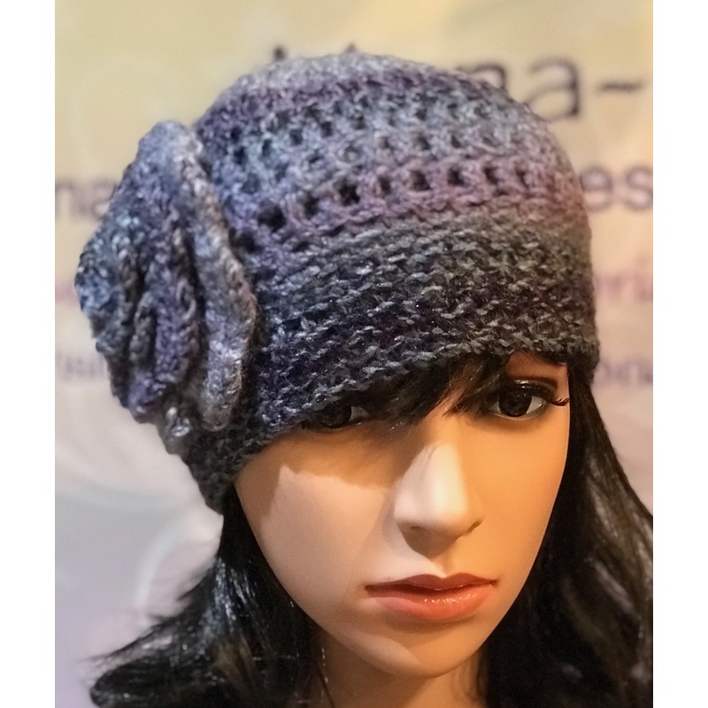Women’s multi tone hat with a  matching flower by Sherri Gold