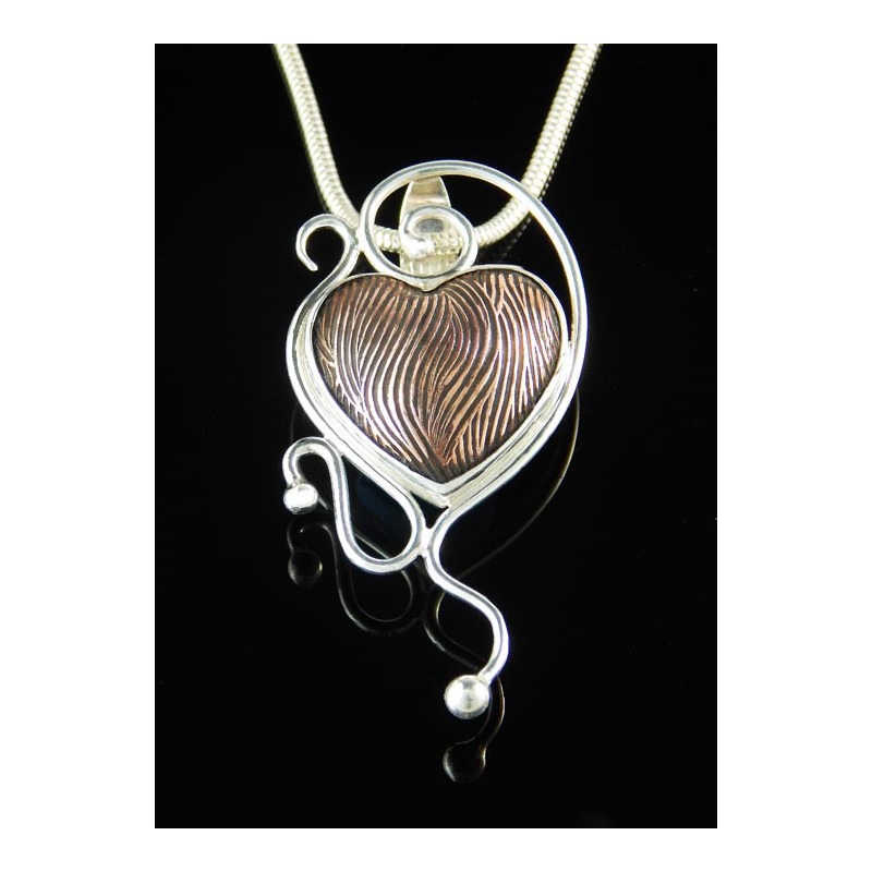 Copper heart pendant by Harry Mackie