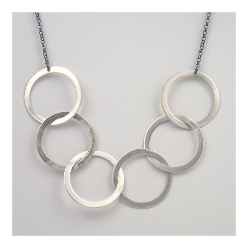 Silver six ring necklace by Lauren Mullaney