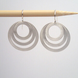 Silver three rings earrings by Lauren Mullaney