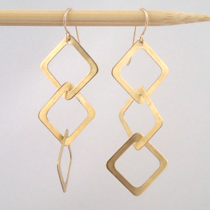 Medium brass Three Diamond earrings by Lauren Mullaney